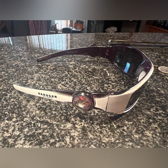 Bakugan themed sunglasses childrenThey have small scuff & Oakley look alike pair - Picture 6 of 12